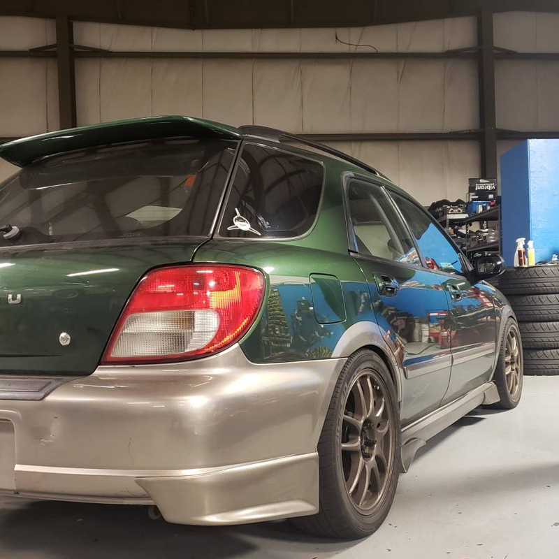 Illustration for article titled At $15,000, Does This WRX-Swapped 2002 Subaru Impreza Suitably Impress?